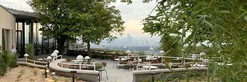 Outdoor dining area with a view of Vienna